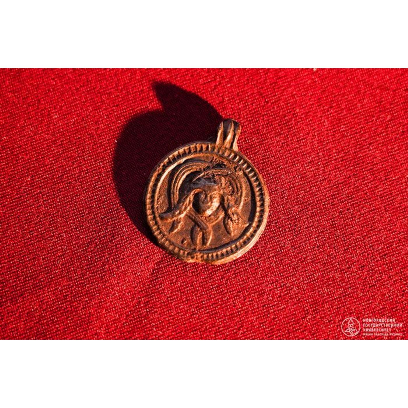 1,000-Year-Old Serpentine Pendant Blends Saint and Medusa | Ancient Origins